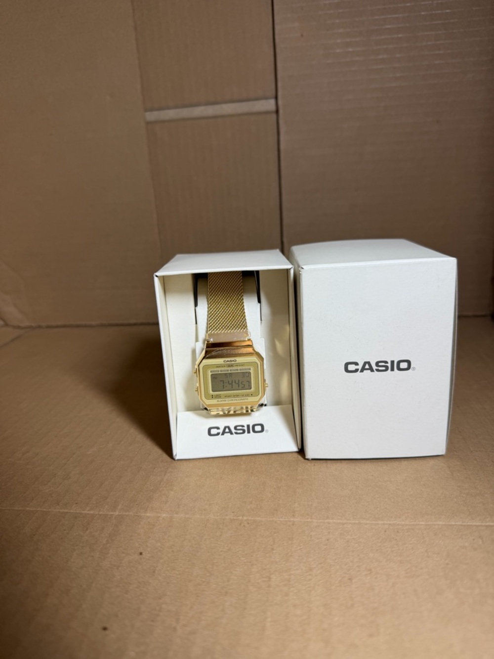 Casio Gold Tone Mesh Digital Watch with Square Face